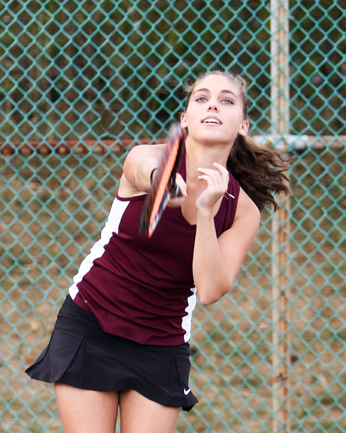 Junior Patricia Schenfeld follows through on a shot. Schenfeld partnered with Suranjana Thakuria at No. 2 doubles this season.