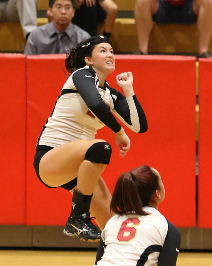 Senior Morganne Bennett unleashes some fury for the Raiders in a match earlier this season.