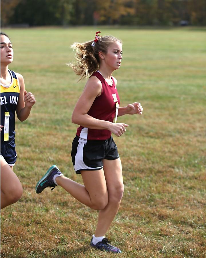 Senior Kelly Ciancola helped the girls x-country team capture county and state titles in 2015.