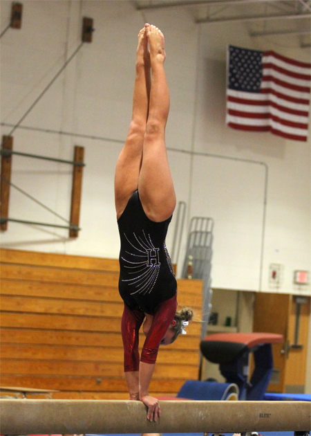 Senior Natalie Onderko demonstrates the type of beam work that has made her one of the top gymnasts in the state.