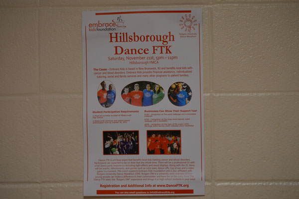 Flyers in school announce the Hillsborough Dance FTK. The event takes place at 5:00 p.m., Nov. 21