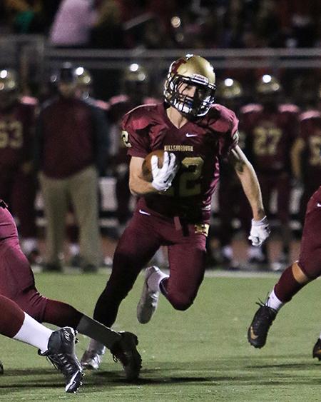 Senior Ryan Melillo carries the ball for Boro. The Raiders fell to Elizabeth 28-21 in overtime on Homecoming Night.