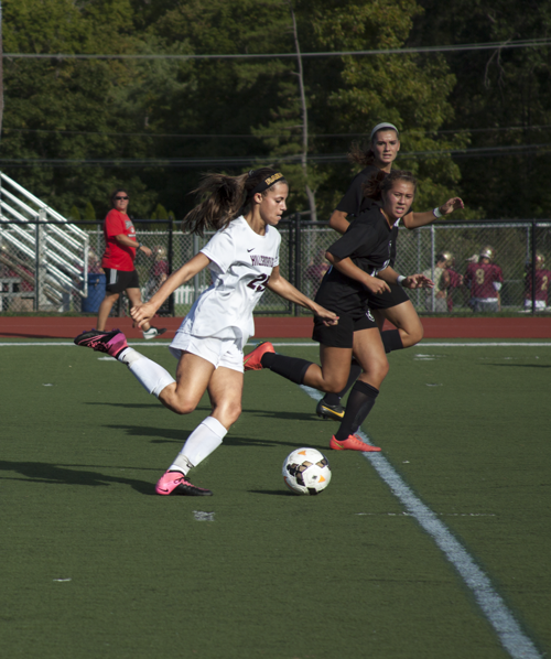 Junior Carly Swetz blasts a ball into enemy territory in the  team's 2-1 loss to Bridgewater-Raritan.