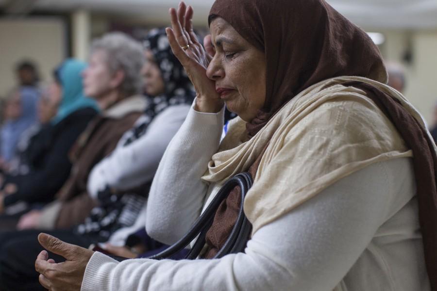 Nasreen Rehman is drawn to tears during an interfaith prayer service for the victims of the San Bernardino shooting rampage at the Islamic Center of Inland Empire in Rancho Cucamonga, Calif., on Saturday, Dec. 5, 2015. "I feel such overwhelming sadness for the victims and their families," Rehman said.