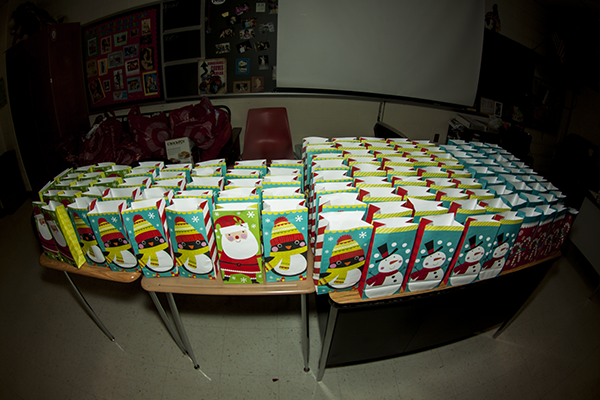 Gift baskets for the families of battered women were distributed during the holiday party sponsored by student council.