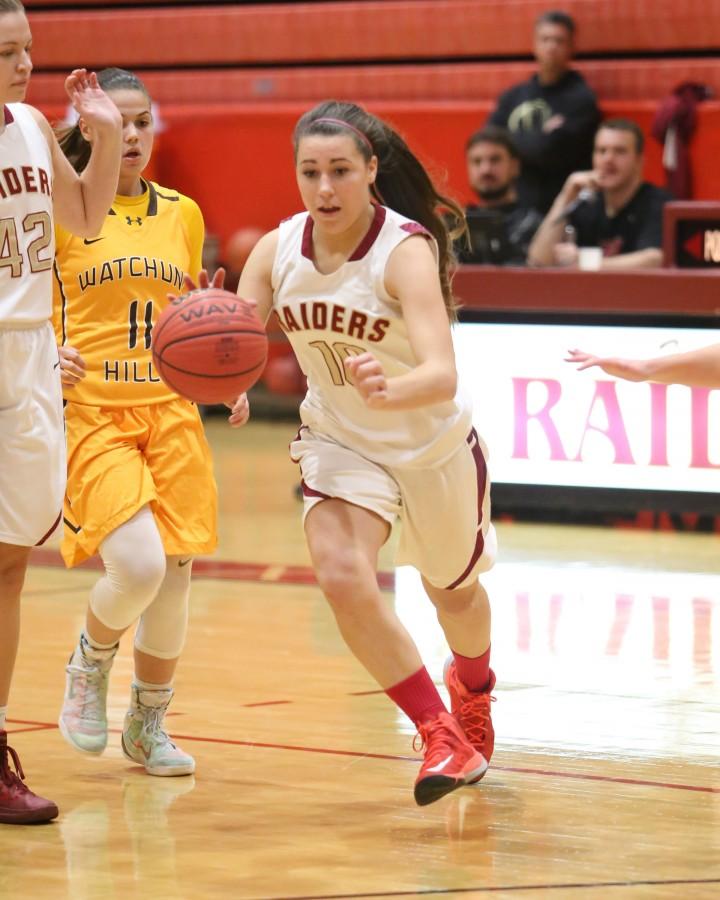 Senior Sam Boyer penetrates the defense in the team's 50-44 loss to Watchung Hills.