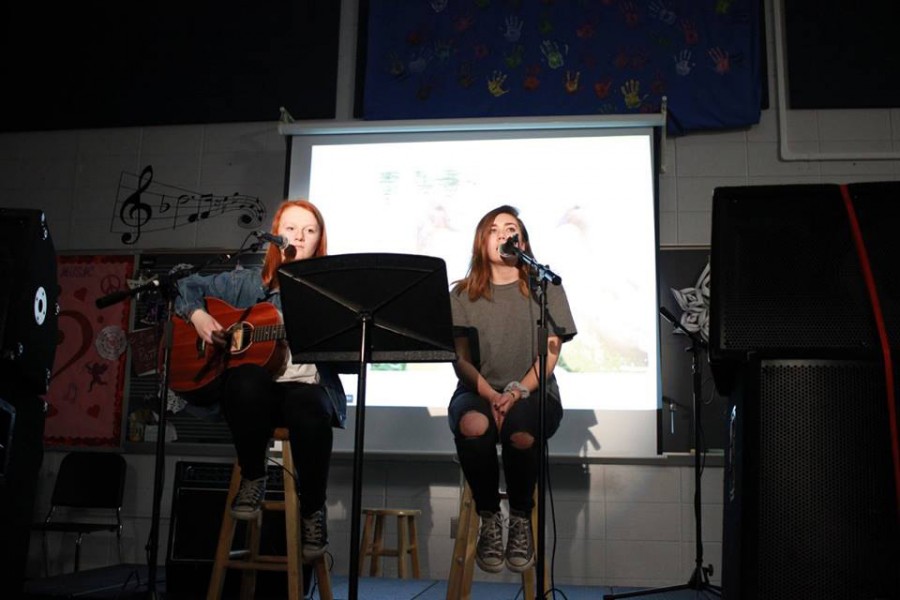 Junior Emma Seiwell and senior Jamie Wouters performing at last week's Coffee House sponsored by NAHS and Tri-M.