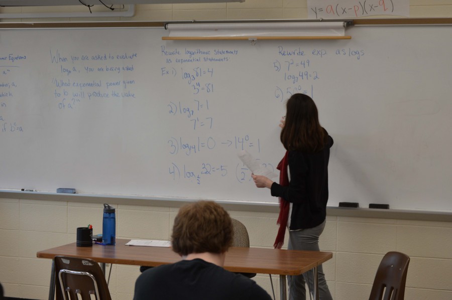 Math student teacher Monica Bernstein leads the class through a lesson in Algebra II Honors. 