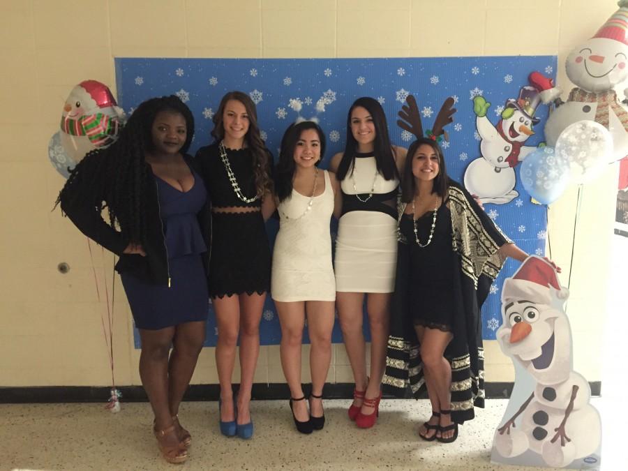 From left: BOE Representative Gifty Adombire, Vice President Carly Swetz, Secretary Kathy Chen, Treasurer Alex Chedid, and President Alia Rind take a moment to enjoy all their hard work preparing the evening for Snowball 2016.