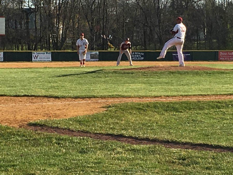 Senior Dan Stoddard winds up for a pitch against Bayonne. 