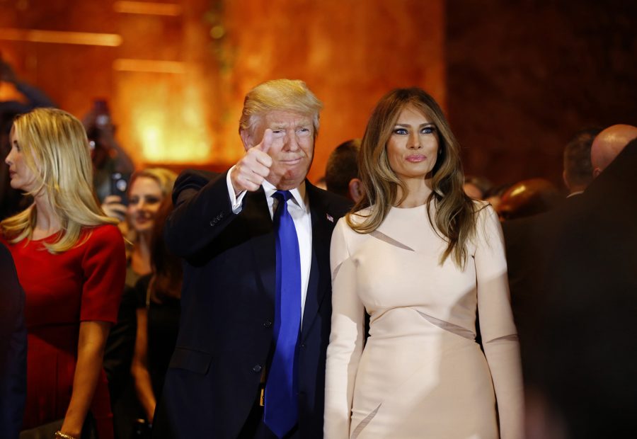 Republican presidential candidate Donald Trump arrives at a news conference with his wife, Melania, at Trump Tower in Manhattan, New York, on Tuesday, April 19, 2016.