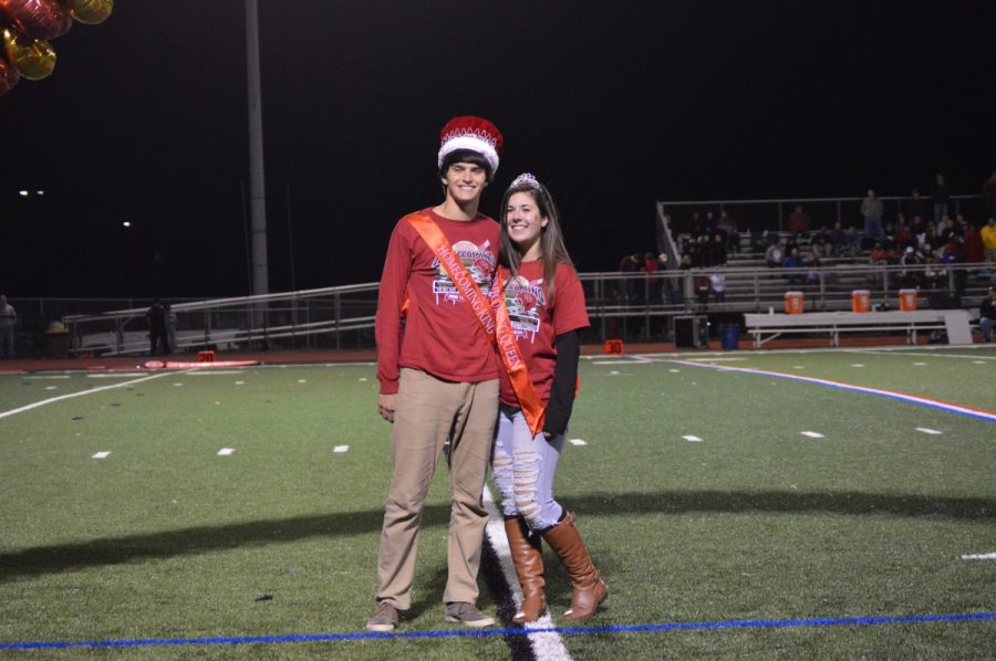 Senior homecoming king and queen, Chris Haber and Emily Russo, pose after their coronation.