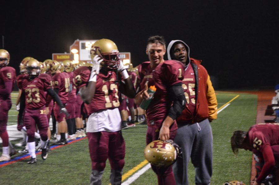 Junior Jack Edwards celebrates one of his game-changing plays with teammates. 