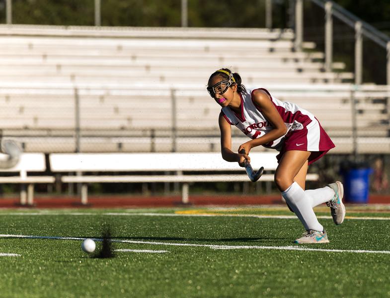 Hillsborough senior Tara Wattal sends a smash into enemy territory.