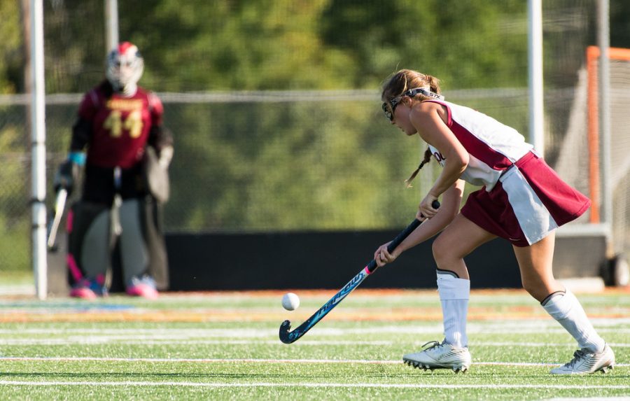 Junior Annie Ryan controls the ball in a recent match for the girls field hockey team.