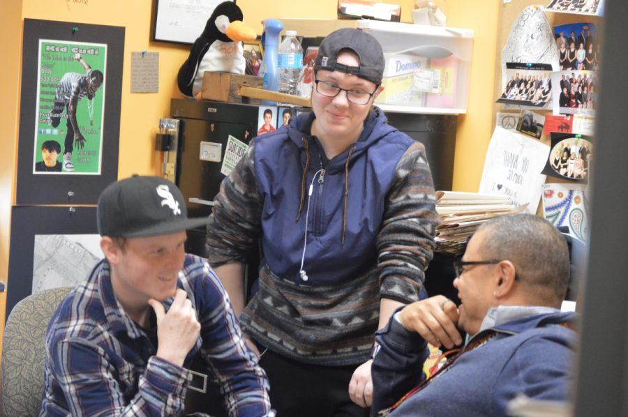 From left to right, junior Damien Filoramo and sophomore Amanda Dinsmore talk with Student Assistance Counselor Gil Pilarte. Pilarte was recently named Educational Services Professional of the year.