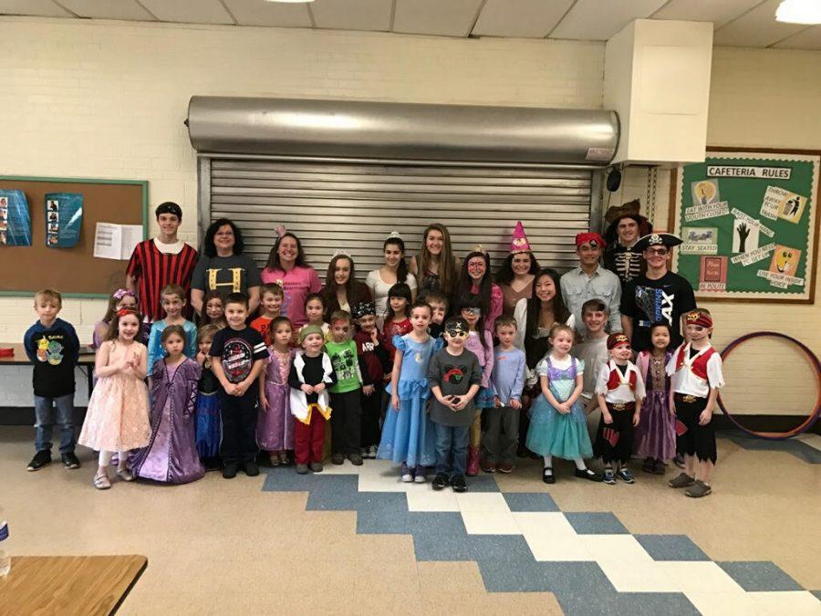 Students pose during the Pirate and Princess Party organized by the sophomore class.