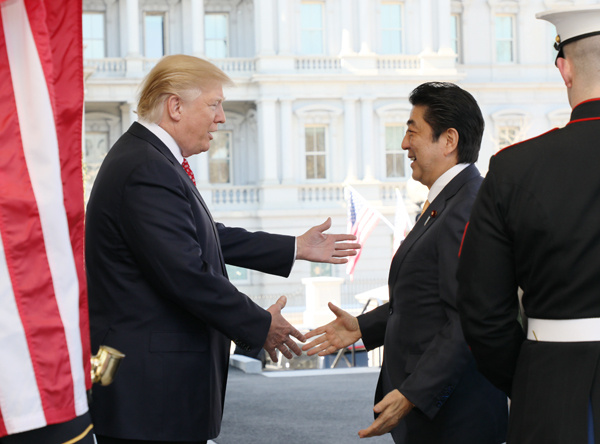 President Donald Trump welcoming Prime Minister Shinzo Abe to the White House.