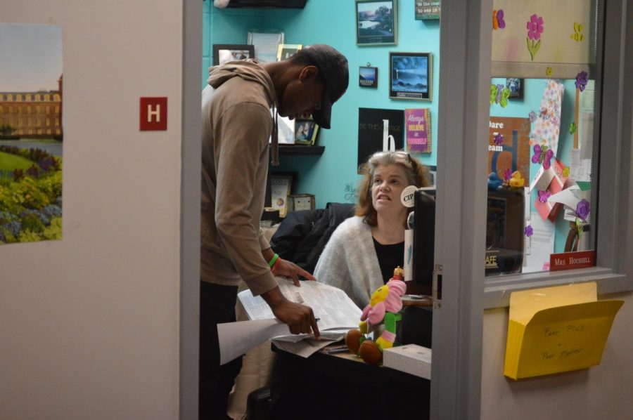 Junior Justin Brown discusses his scheduling options with guidance counselor Laura Houssel.