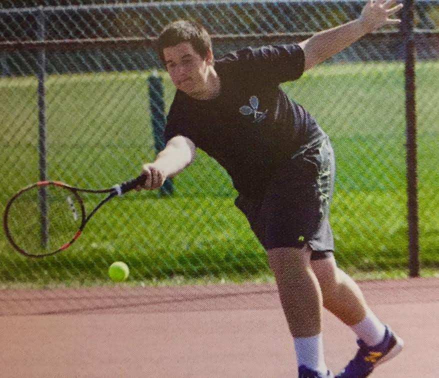 Senior David Spinrad lunges for a forehand during a recent match.