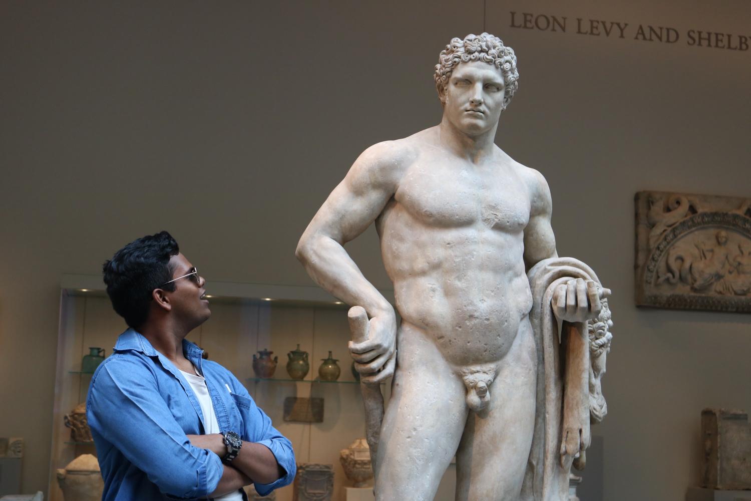 Senior Mahesh Indraganti sizes up the classical art on disaplay at the Met during last month's Latin trip.