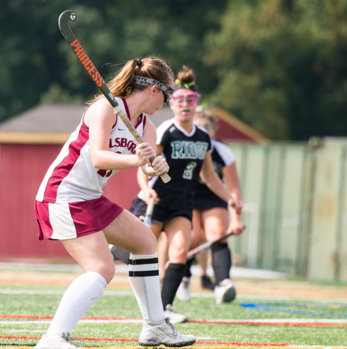 Senior Mackenzie Kiernan prepares to launch the ball into enemy territory.