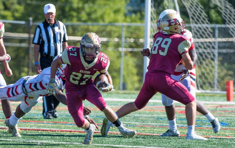 Freshman Sean Levonaitis navigates through the defense in a varsity game against Plainfield. 