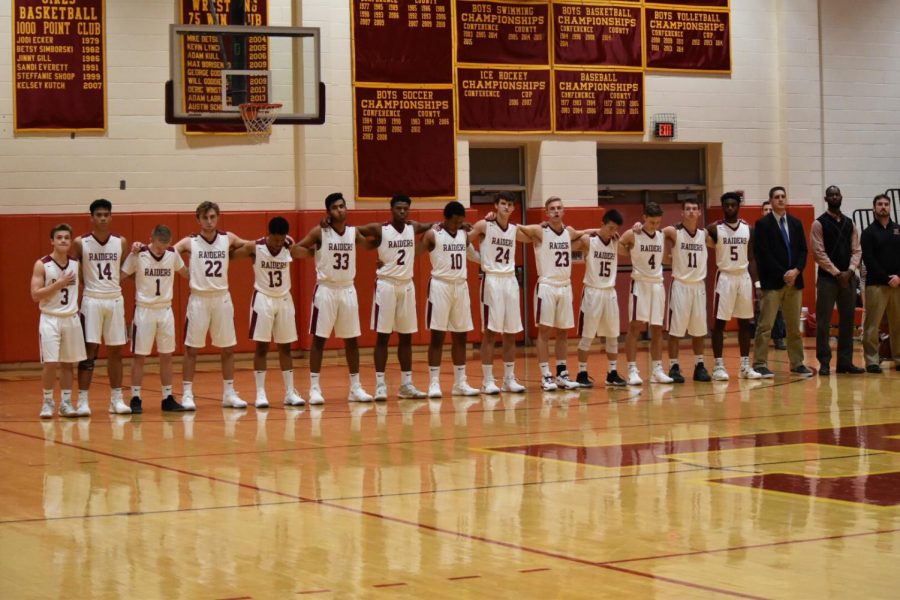 The boys basketball team lines up just prior to tipping off the new season on Dec. 15.