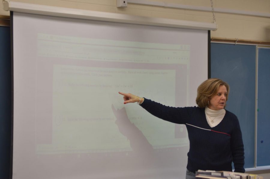 Math teacher Elizabeth Berliner reviews her midterm with her period 4/6 class.