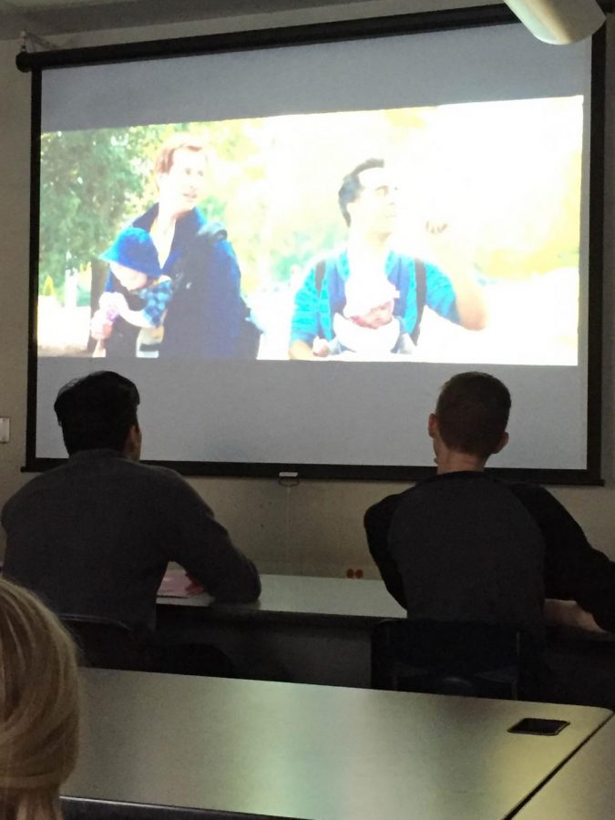 Seniors Aron Lauan and Justin Gumpel watch a parenting movie in their health class. 