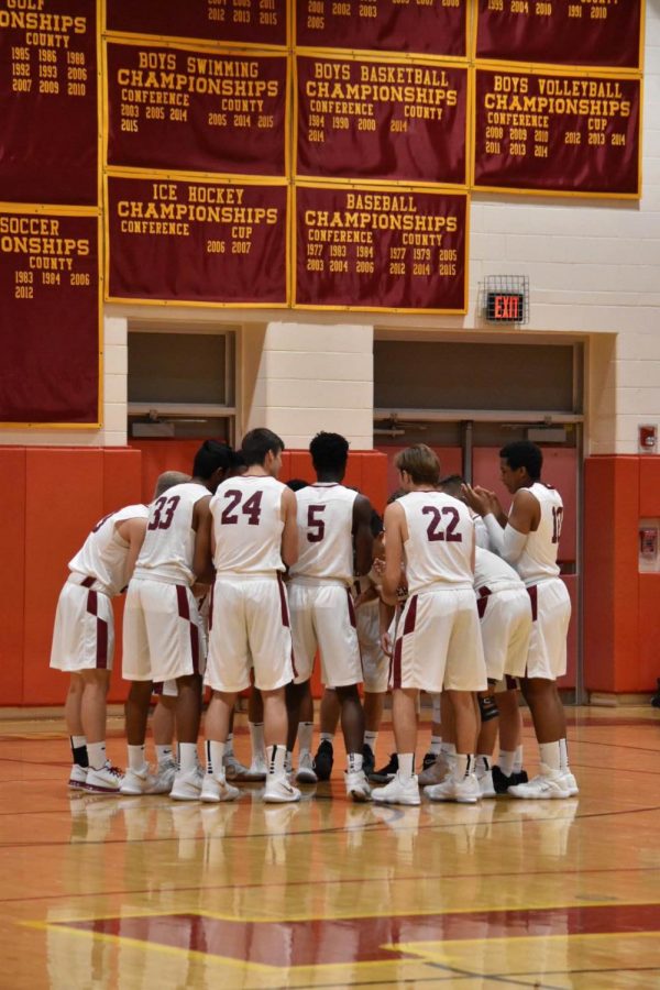 The team huddles before a play earlier this season.