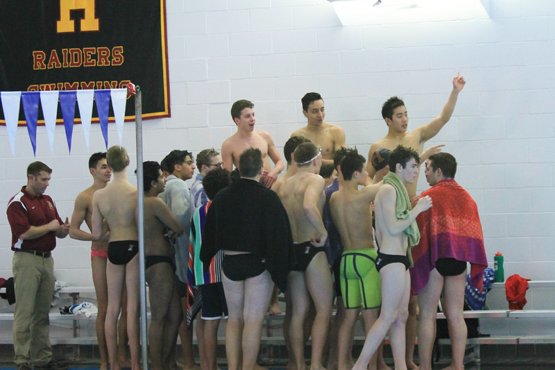 The team gathers to celebrate after learning they defeated Marlboro to advance to the sectional championship.