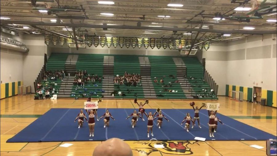 Cheerleading competition team competes in one of their competitions throughout their season.