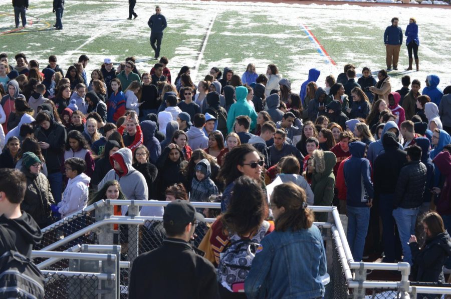 The leaders of the walkout face the crowd. 