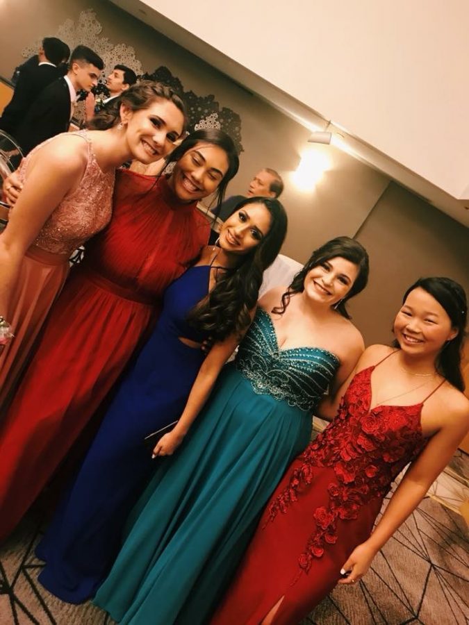 Juniors Alex Hughes, Raven Murray, Riya Desai, Brooke McCormick, and Corey Moon pose at junior prom.