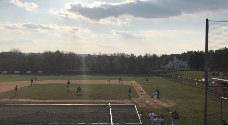 Sophomore Jason Wolff crosses the plate for the winning run. The Raiders defeated rival Bridgewater-Raritan 1-0.