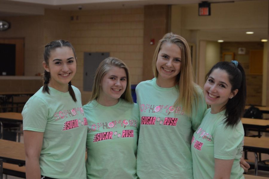 Sophomores Natalie Nork, Amanda Cohen, Patrycja Kania, and Julie Weinstein show off the Sophomore Sugarrush shirts before homeroom. 