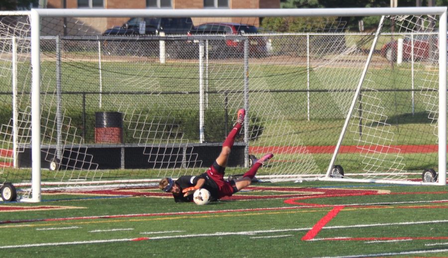 Senior Nick Burd saves a penalty in the season opening win over Hunterdon Central.