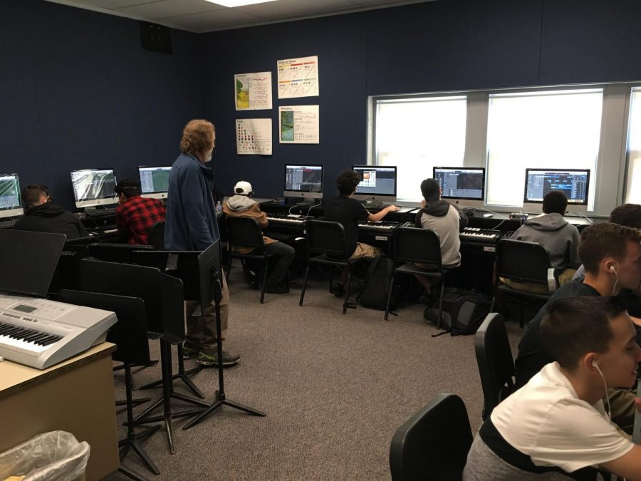 Students creatie music with keyboards on Logic Pro X, as music teacher Jonathan Klizas advises. 