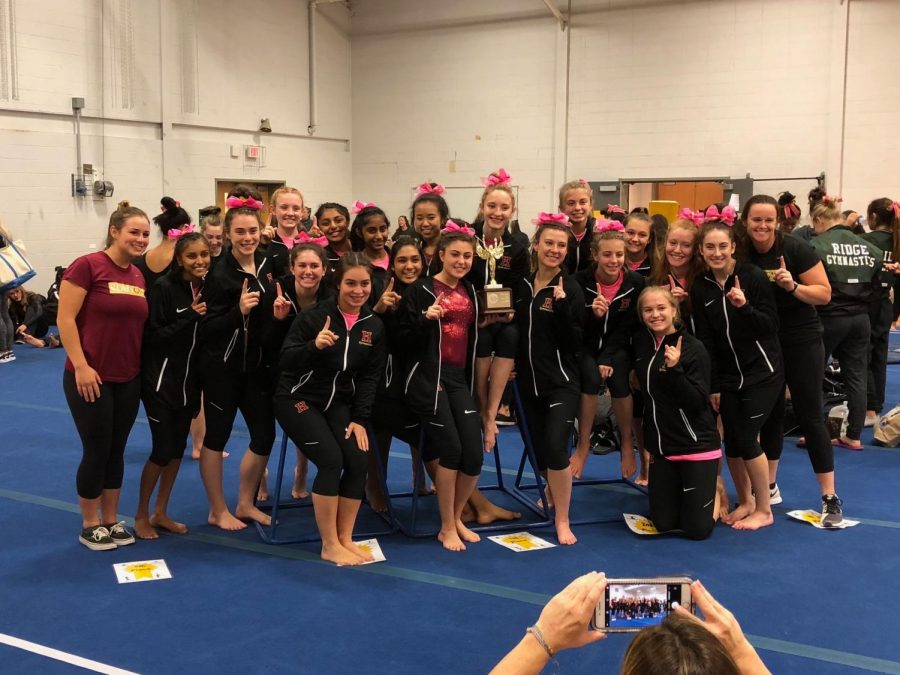 Raider gymnasts gather for a celebratory picture after capturing its fifth straight Somerset County Title.