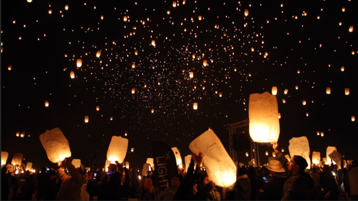 The sky lanterns take flight and illuminate the night sky at The Lights Fest.