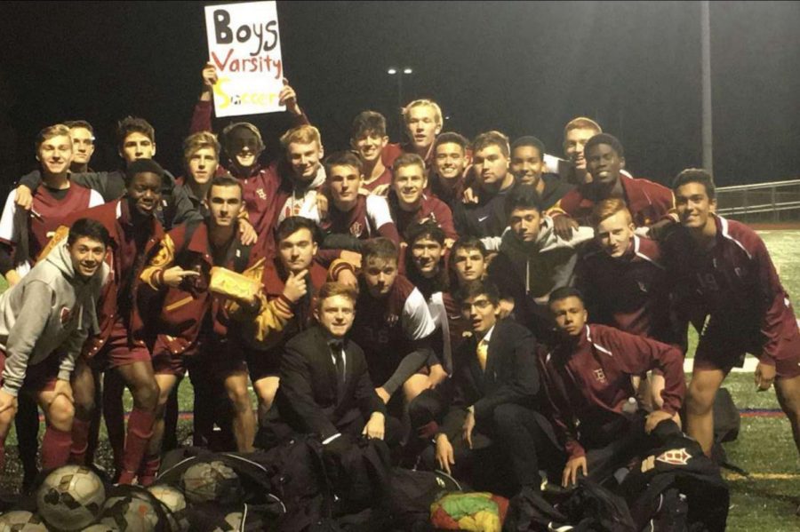 The boys soccer team poses after their well deserved senior night win over Montgomery.