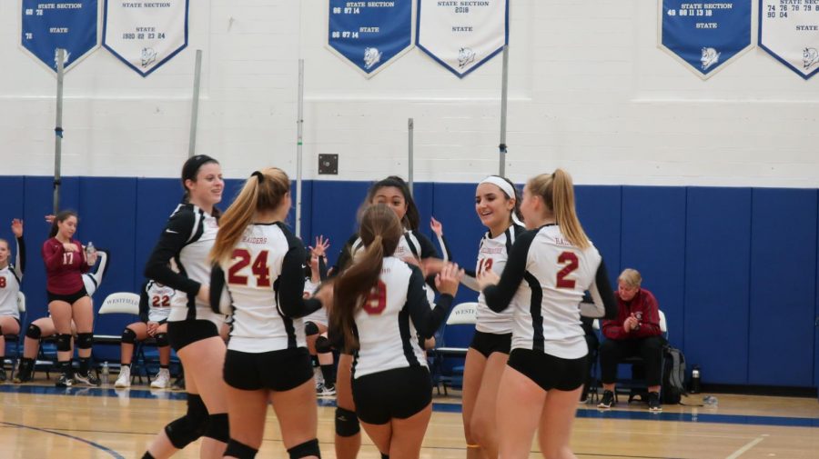 The girls celebrate after winning their first game in the NJSIAA state tournament against Hackensack. 