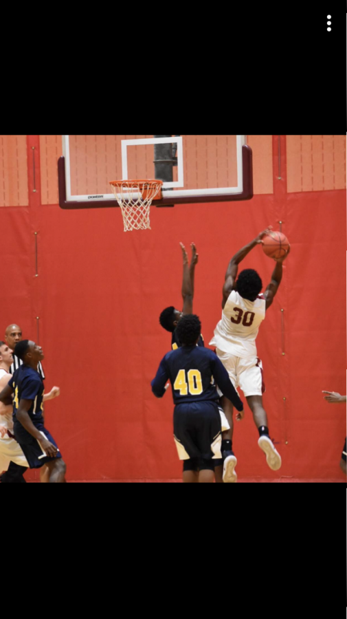 Junior Jared Smith going up for a layup against Franklin High School. 