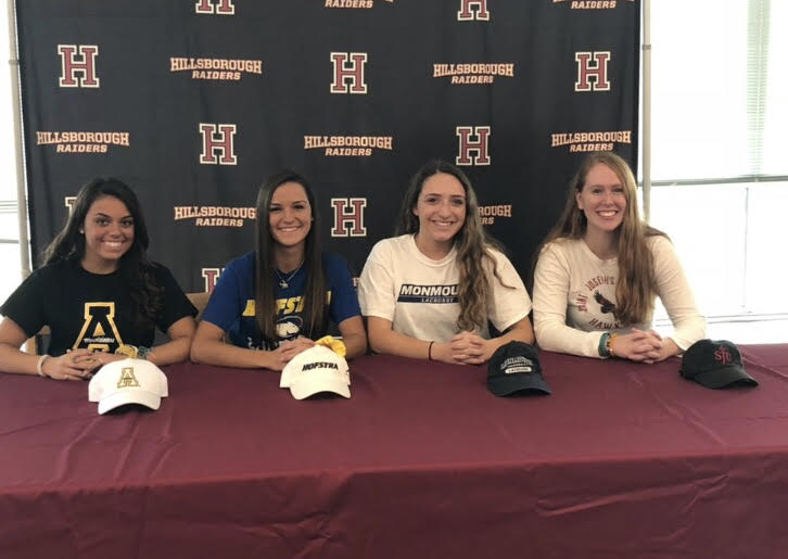 The four future colelge athletes getting ready to sign their contracts. (From left to right) Delaney Smith, Kendall Smith, Gabriella Vangeli, Lisa Ross.