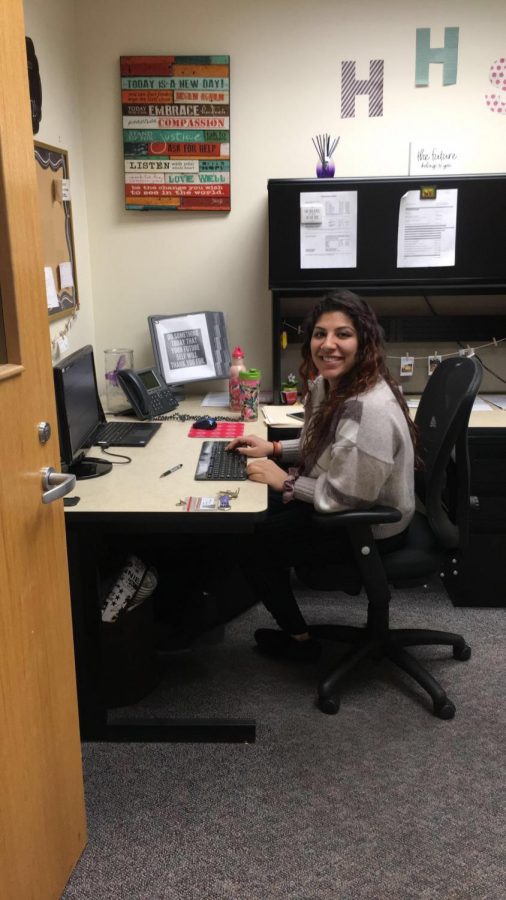 Trikha works on midterm schedules in her office located in the downstairs guidance office.