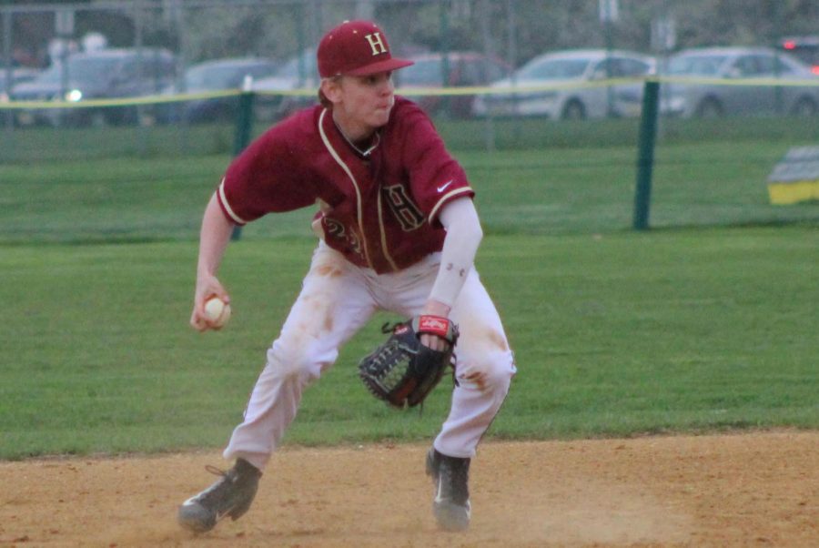 Sophomore Luke Crawford fields a ground ball. Crawford is expected to have a breakout season as one of the team's middle infielders.