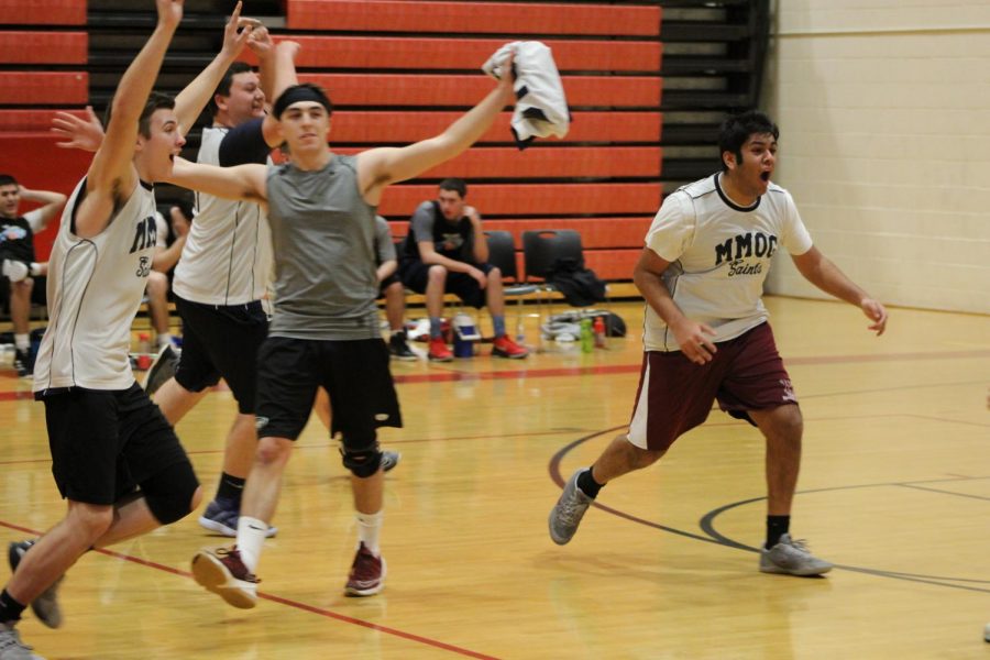 Juniors Milan Jain, AJ Vinchur, Thomas Haber, and Connor Graverson celebrate their championship victory after a long, hard-fought game.