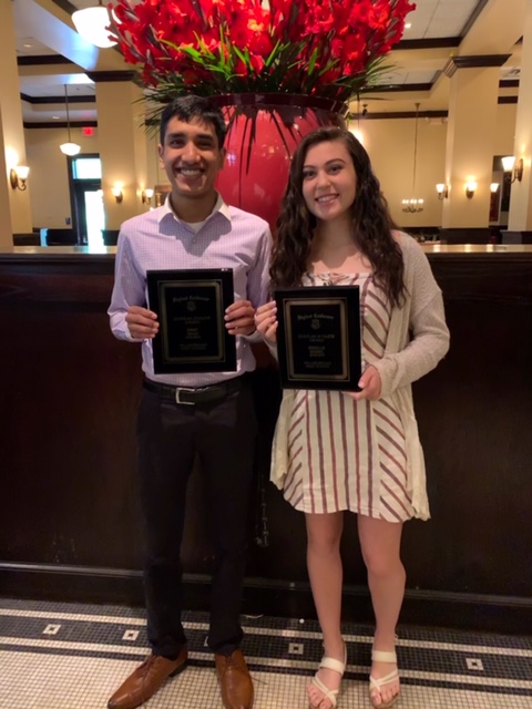 Shah and Seidel pose with their scholar athlete awards.