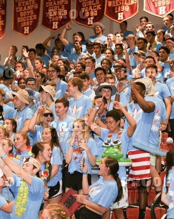 The seniors celebrating their win in the packed bleachers.